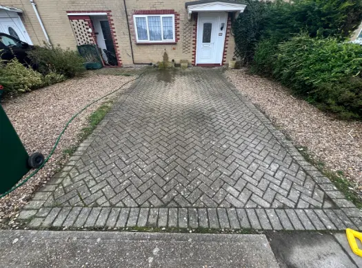 Dirty driveway before pressure washing